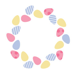 Composition of multi-colored painted Easter eggs laid out in the form of a wreath