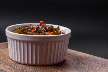 Delicious marinated seaweed with paprika, spices and salt