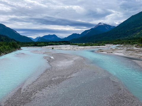 Blue water and stone banks of the lech river in austira