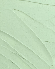 Obraz premium Beauty cream texture. Green cosmetic mask background. Creamy skincare product closeup