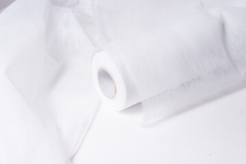 Non woven material, covering roll for medical bed