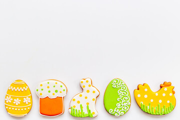 Easter baking background with cookies eggs and bunny, top view