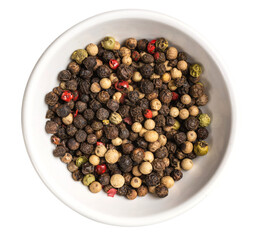 Dry pepper in wooden bowl isolated on white background.