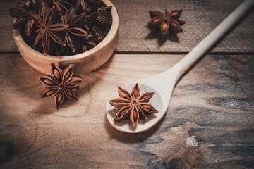 Star anise cooking spice drying on a bamboo mat