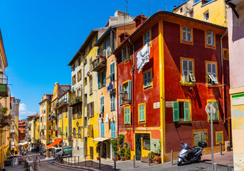 Colorful tenement houses along Rue Rossetti street in Vieille Ville historic old town district of Nice on French Riviera in France