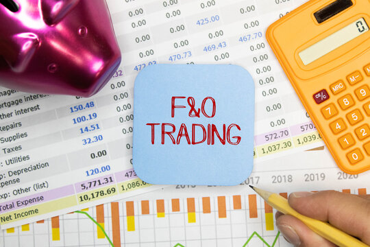 F and O Future and Option Trading inscription on notepad with calculator