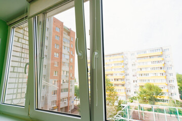  large glazed windows. interior of the balcony in the apartment. 