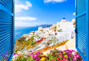 Foto op Plexiglas Hillside view through an open window with blue shutters of the blue dome church, caldera, sea and white village of Oia on the island of Santorini, Greece. © Kirk Fisher