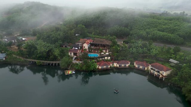 Hotel near river in Vietnam, drone view, Vietnam
Quand bing province Vietnam, february,15, 2023

