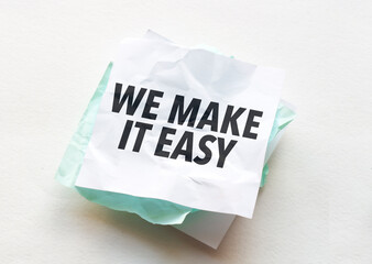 paper with text we make it easy on white background
