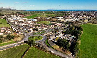 Fototapeta na wymiar Aerial view of Residential homes and business in Millbrook Larne in County Antrim Northern Ireland