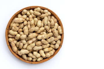 Raw peanuts on white background.