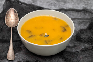 Vegetable cream soup with spinach in small bowl