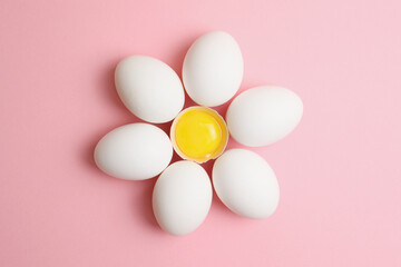 fresh farm chicken eggs on a colored background