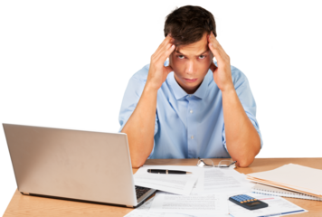 Portrait of a Desperate Businessman with Financial Figures and Laptop