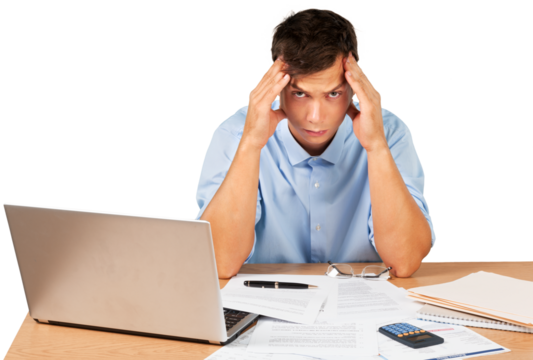 Portrait of a Desperate Businessman with Financial Figures and Laptop