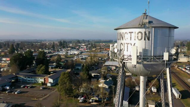 Cinematic Rotating Aerial Pan From Junction City, Oregon Old Water Tower to Downtown Junction City and Surrounding Area
