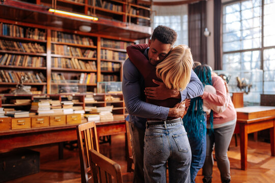 Couple in mental health therapy embrace.