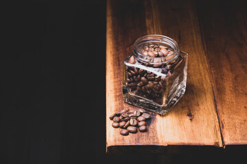 Premium Colombian Coffee Beans on Wooden Plank
