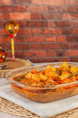 Chicken with potato Pyrex tajin 
It is a typical lunch meal in Egypt. Fit for families and cooked in Ramadan month. 