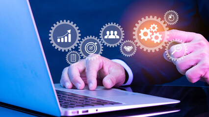 Businessman showing virtual screen of gear cog icon present operation management involving business process, workflow, problem solving, high performance, monitoring and evaluation, quality control.
