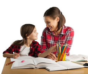 Happy young mother and daughter painting