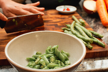 Freshly Chopped Green Beans in Ceramic Bowl