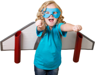 Happy child playing with toy cardboard wings