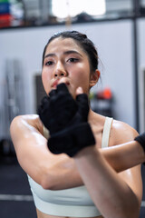 Young beautiful women stretching warmup hands exercising healthy lifestyle in fitness center