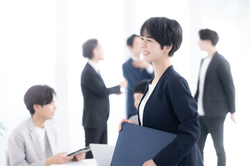 Image of a female businessman working in an office, profile