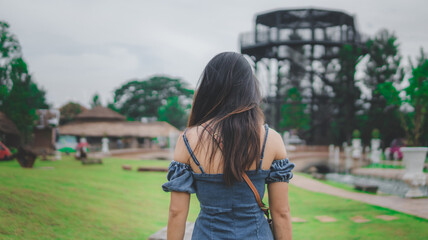 Close up asian woman sexy in summer park outdoor rear view