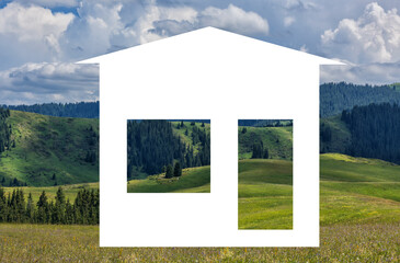 White silhouette of a symbolic house against the backdrop of a mountain pasture
