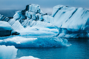 Different shaped glaciers on a lake