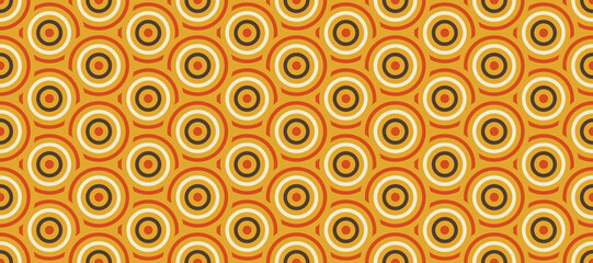 Retro concentric circles seamless pattern. Vintage geometric background in 70s or 80s style. Yellow fabric or textile design. Vector wallpaper. 