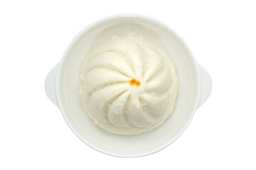 Salapao, steamed Chinese bun, on white round dish.