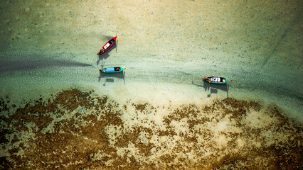 Boats are seen from above on Rawai Beach in Phuket Thailand © Thierry C