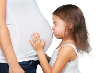 Happy child holding belly of the pregnant mother