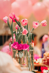 pink tulips at a women's party in a restaurant