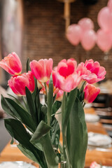 pink tulips at a women's party in a restaurant