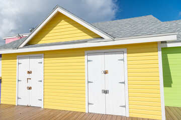 Fototapeta na wymiar yellow beach hut in summer. beach hut building in summer. photo of beach hut in summer.