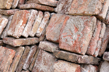 Close-up large lot of old vintage bricks for the restoration