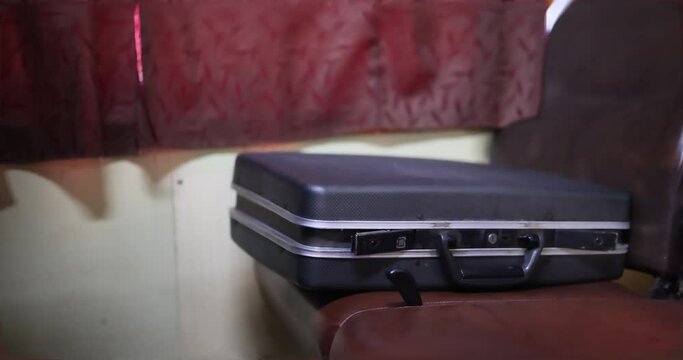The train carriage on which the unattended suitcase was left appeared old