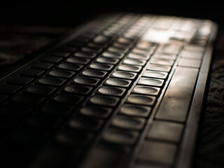 Side profile of keyboard with soft light 