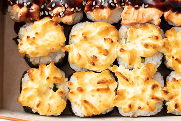 Baked Japanese rolls as background.