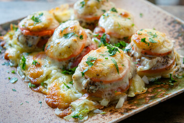 Baked Vegetables with Mozzarella Cheese on Dish, Clean Food Style.