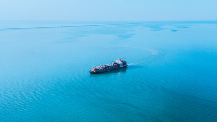 cargo ship in the middle of the sea