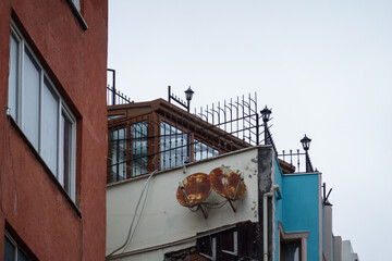 Old building with rusty satellite dishes