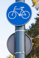 Blue bicycle lane sign. Marking bicycle path