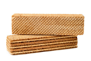 Sweet waffles with a filling on a white background. Two close-up waffles.