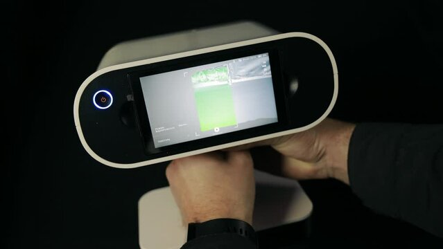 Close up display Handheld scanner for scanning small spaces. 3D laser scanning.